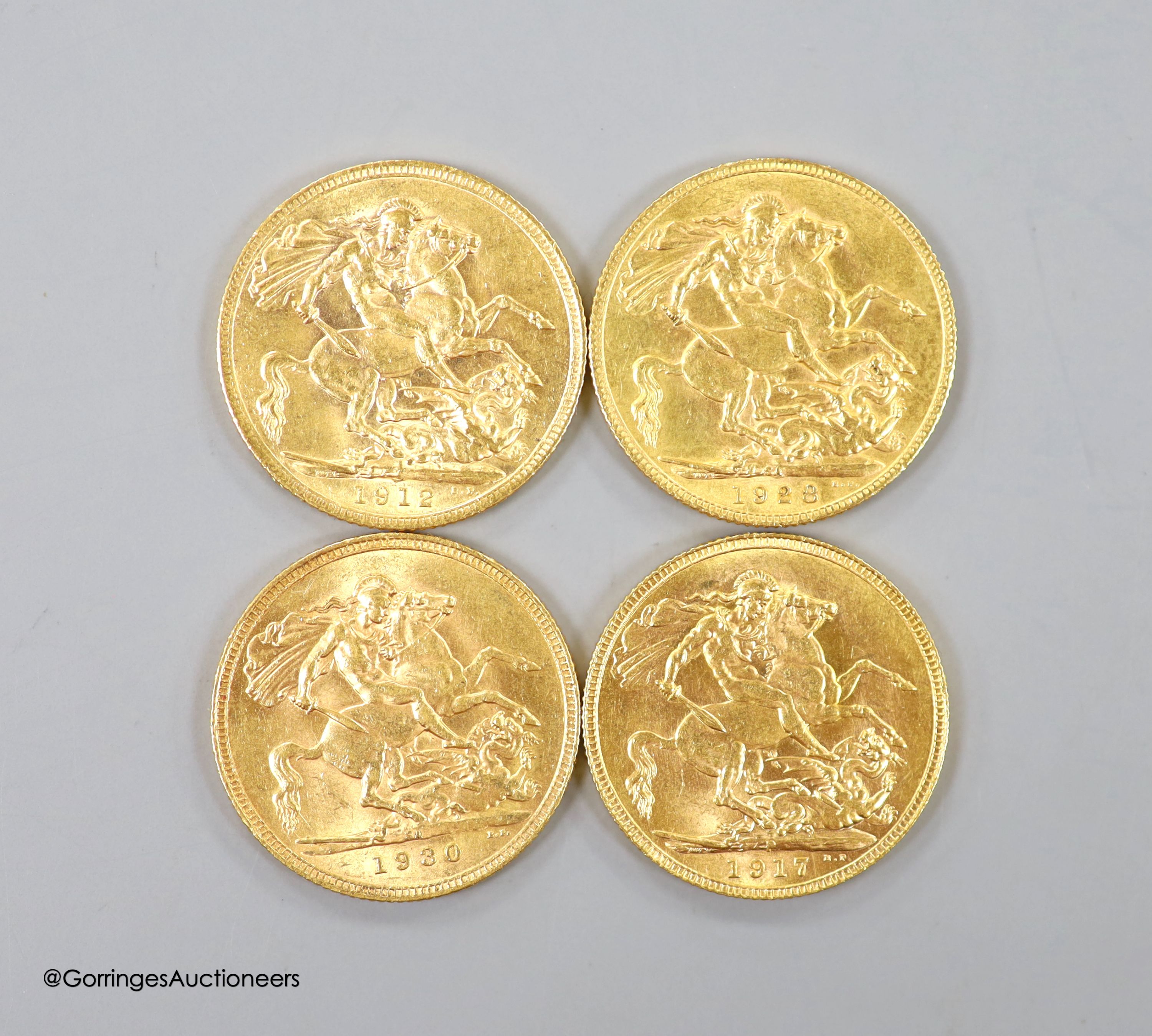 Four George V gold sovereigns, 1912, 1917P, 1928SA and 1930SA